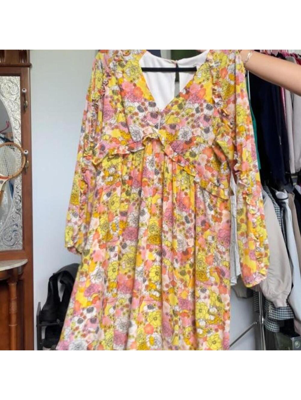 Yellow floral maxi dress with ruffle details. bcbgeneration size S